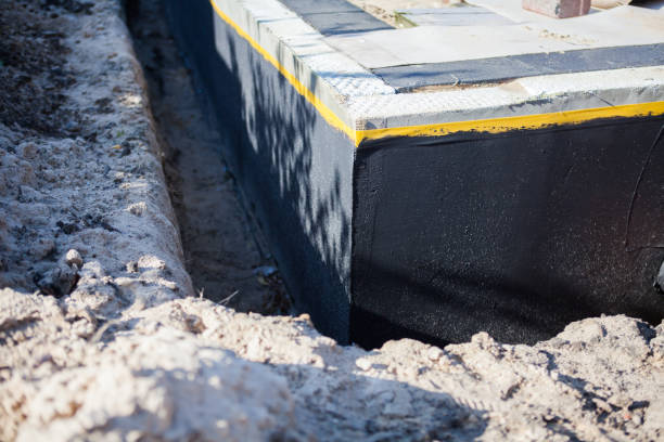 Professional Waterproofing technician working in Clearwater, SC